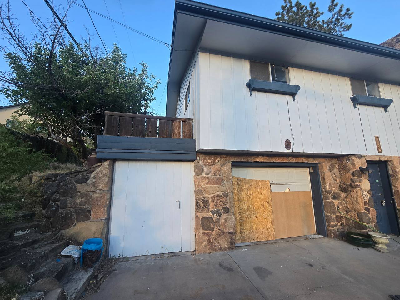 Damaged overhead garage door